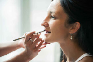 Lisa getting makeup done